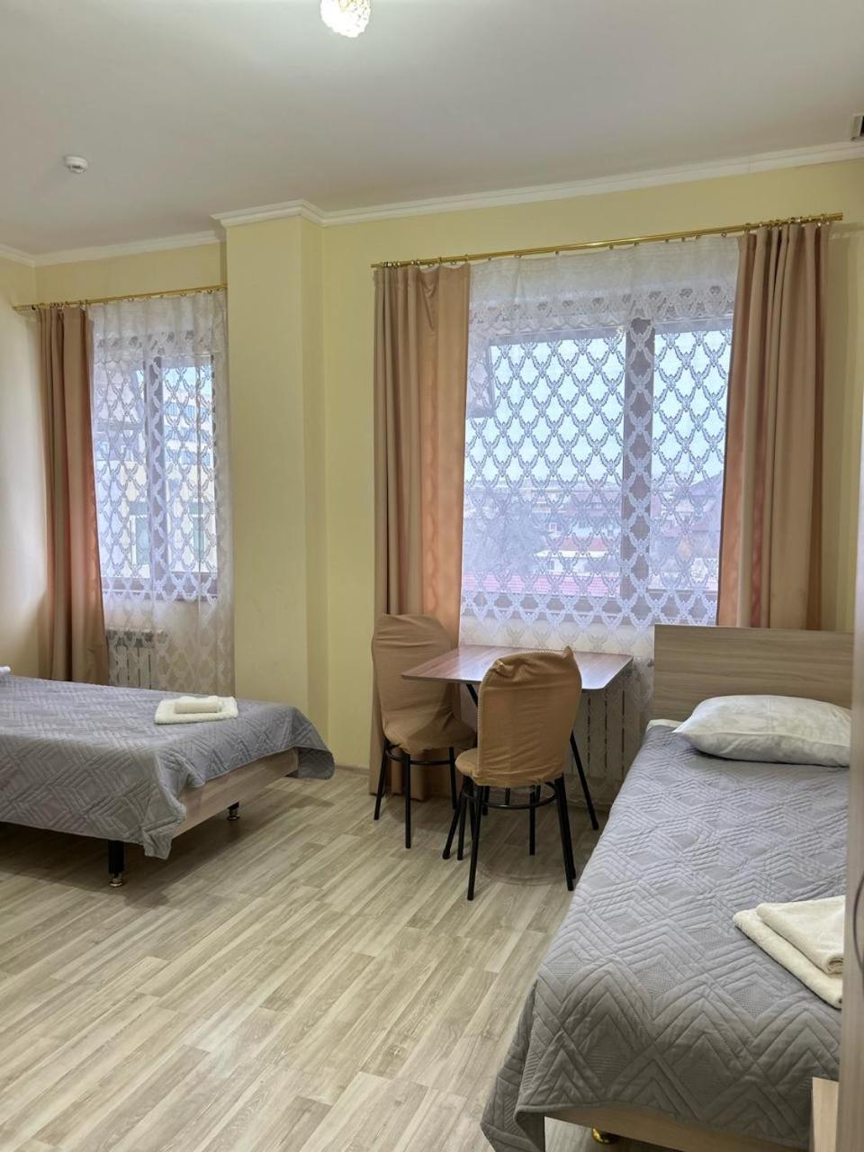 Талисман Hotel Aqtau Kamer foto