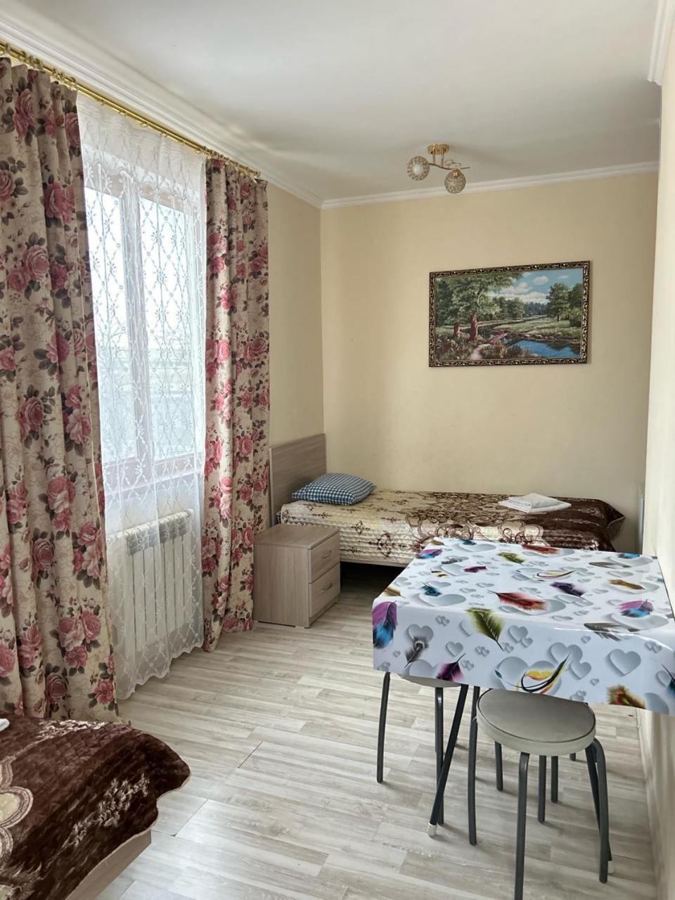 Талисман Hotel Aqtau Kamer foto