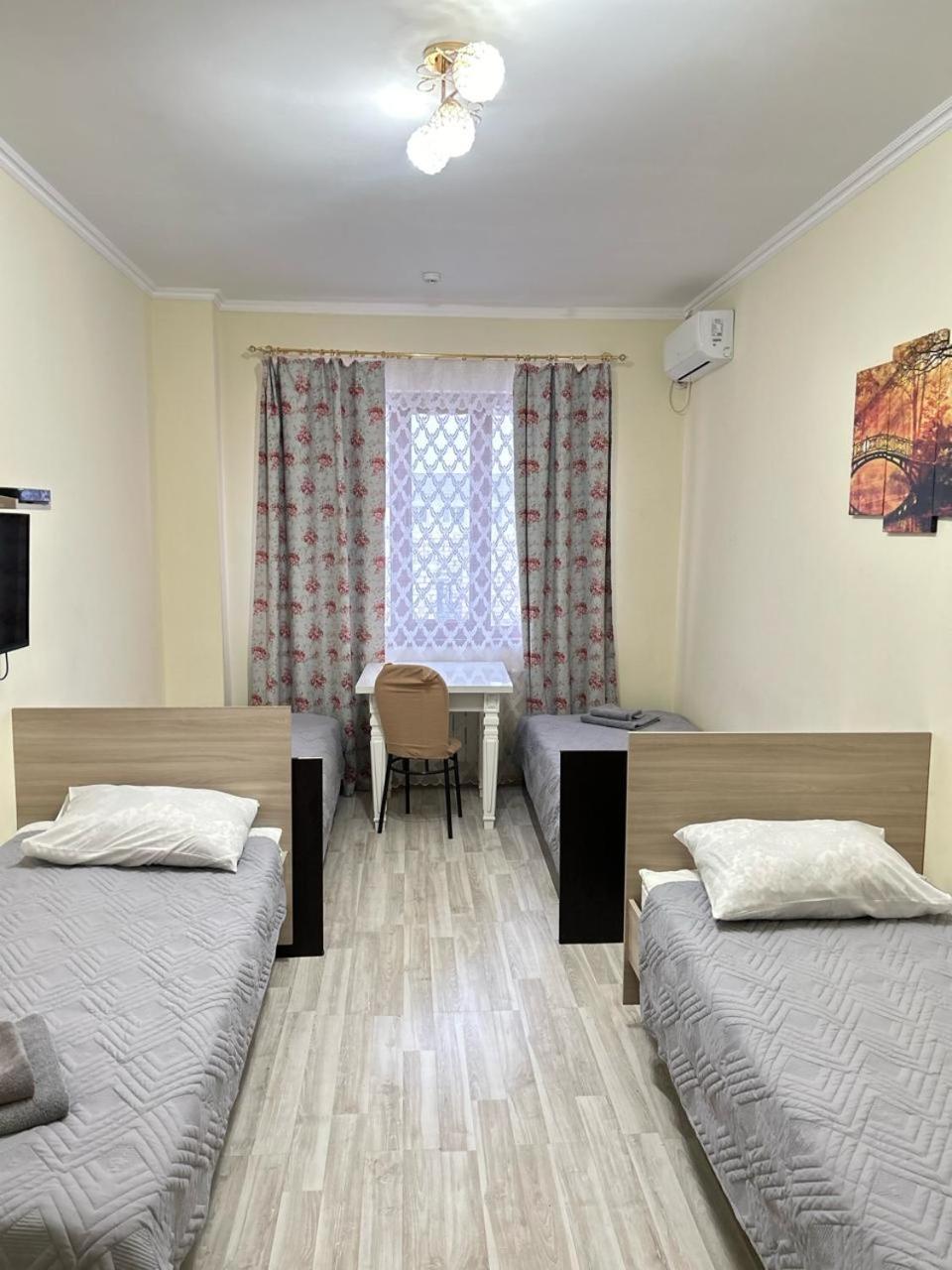 Талисман Hotel Aqtau Kamer foto