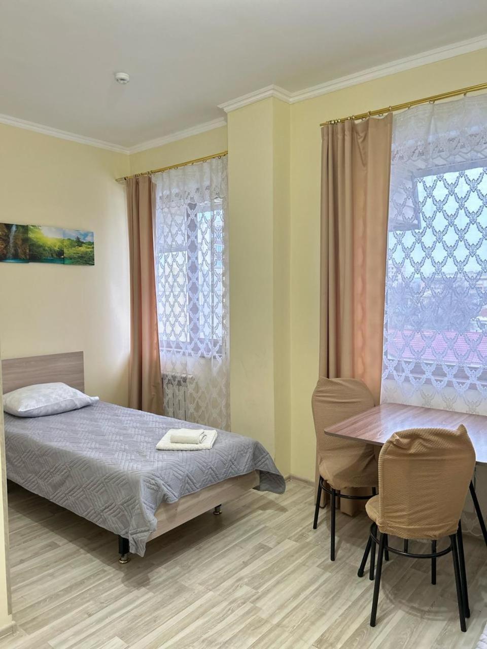 Талисман Hotel Aqtau Kamer foto